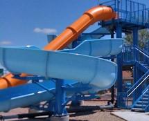 Sports & Recreation Associates designs and installs water slides and spray park equipment. . .